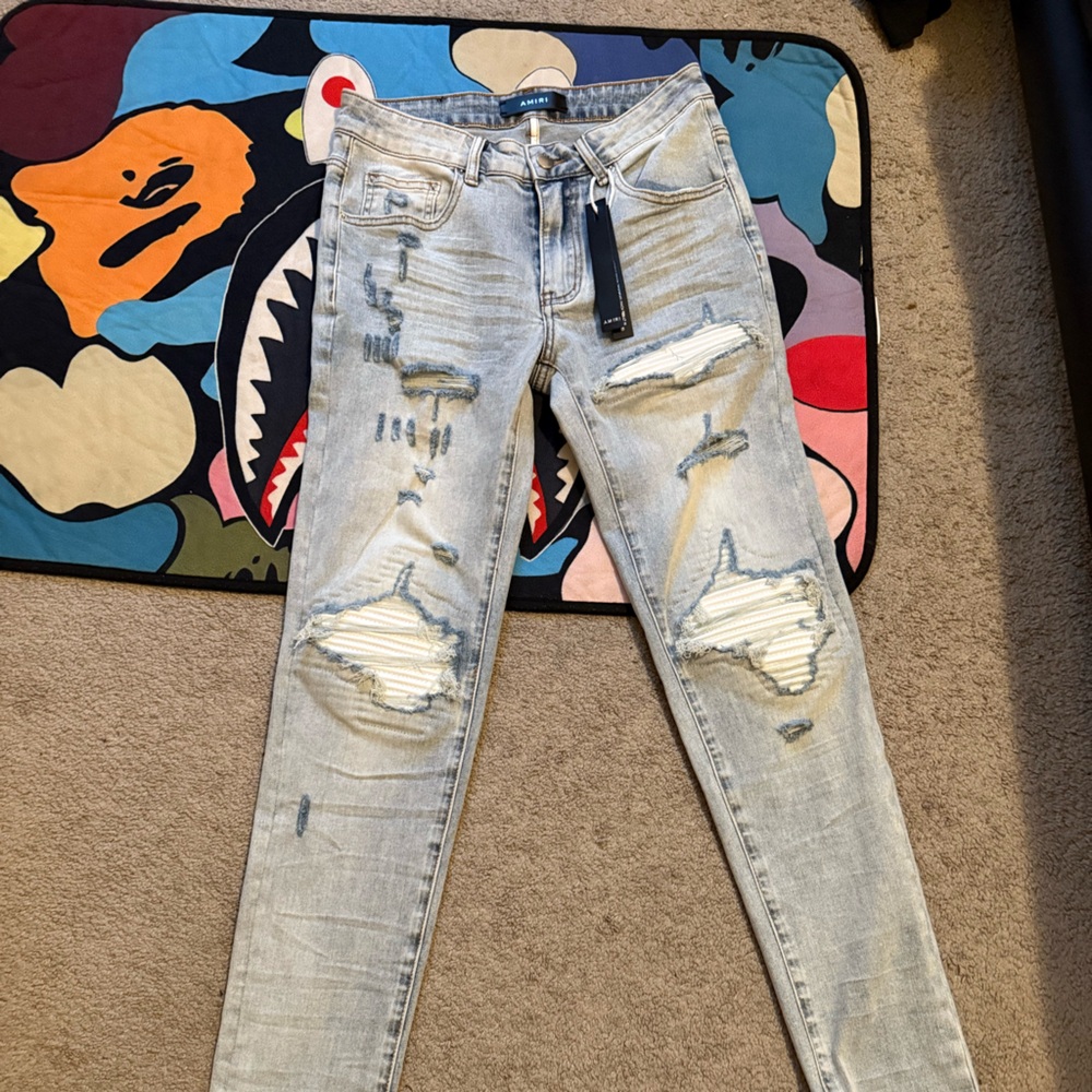AMIRI Light Blue Distressed Skinny Jeans